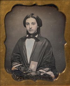 Young Woman Wearing Lace Gloves Holding a Daguerreotype Case, 1860s. Creator: Unknown.