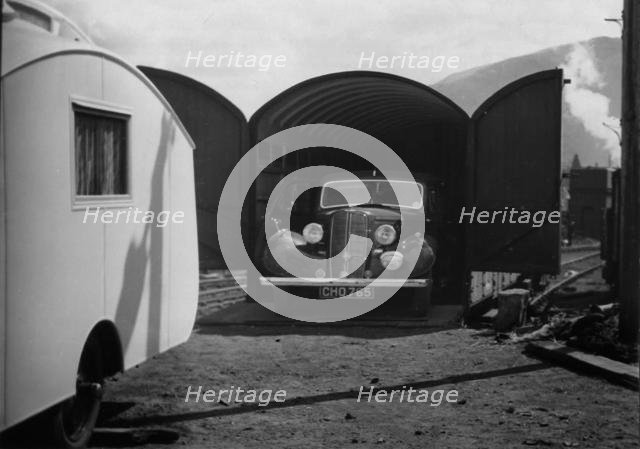 1937 Hillman 14 in rail transportation carriage van. Creator: Unknown.