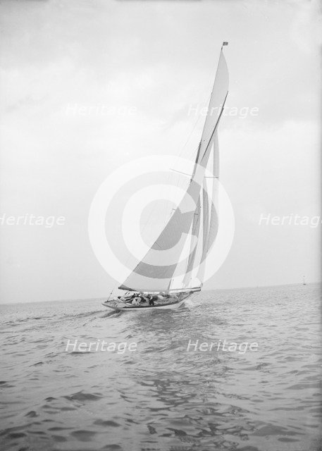The 15 Metre 'Paula III' sailing close-hauled, 1913. Creator: Kirk & Sons of Cowes.