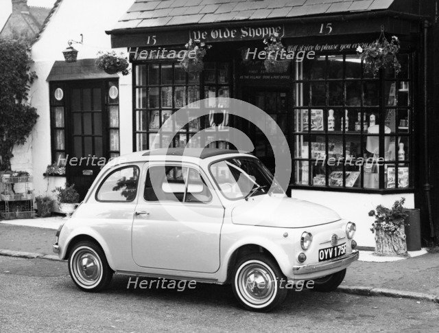 Fiat 500 parked outside a quaint shop, 1969. Artist: Unknown
