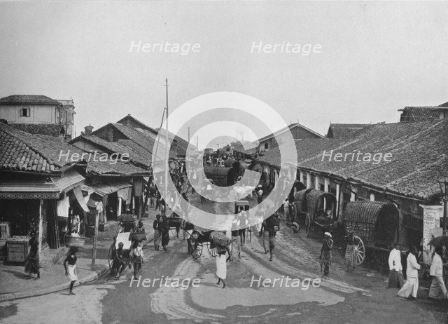 'Typical Street Scene in Native Quarters, Colombo', c1890, (1910). Artist: Alfred William Amandus Plate.
