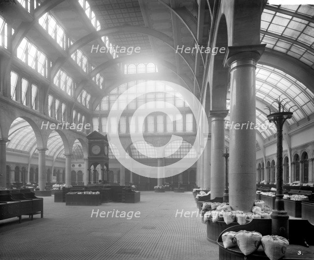 Interior of the Corn Exchange, Mark Lane, London. Artist: Bedford Lemere and Company
