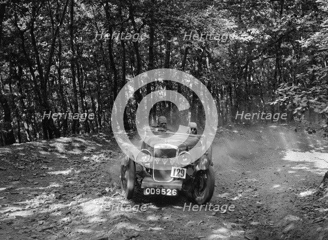 Hillman Aero Minx competing in the B&HMC Brighton-Beer Trial, Fingle Bridge Hill, Devon, 1934. Artist: Bill Brunell.