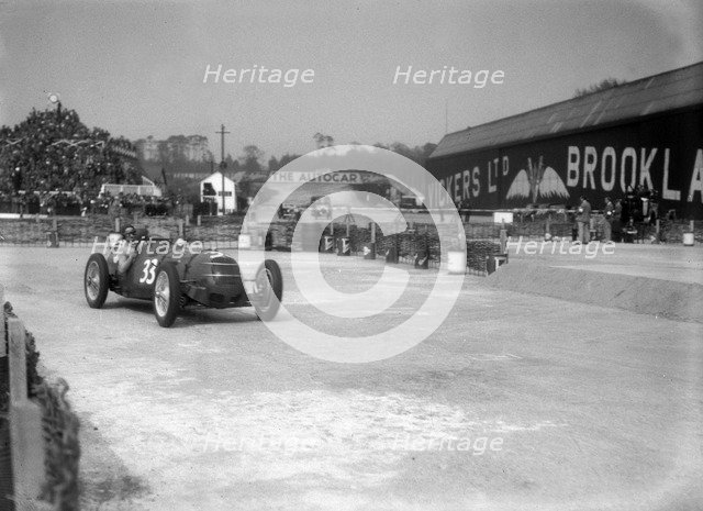 Riley 1985 cc competing in the JCC International Trophy, Brooklands, 2 May 1936. Artist: Bill Brunell.