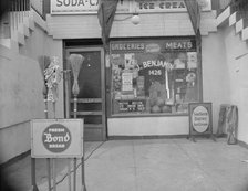 Grocery store across the street from Mrs. Ella Watson..., Washington, D.C., 1942. Creator: Gordon Parks.