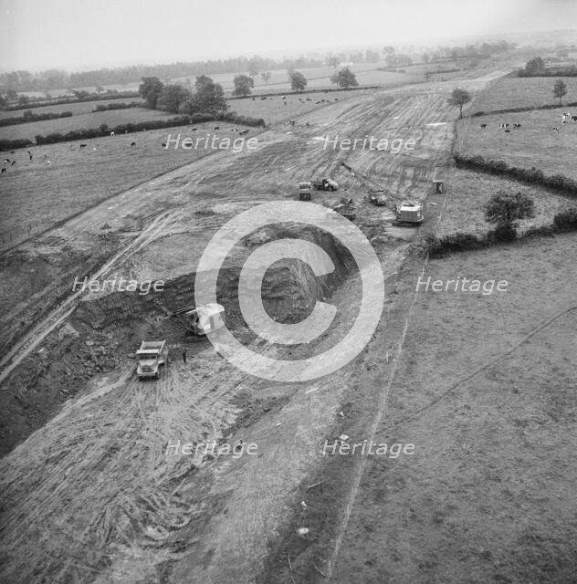 Aerial view of excavation work for the construction of the London to Yorkshire Motorway (M1), 1958. Creator: John Laing plc.