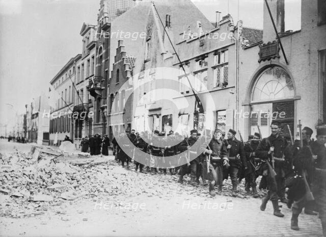 Belgians re-enter Termonde, between c1914 and c1915. Creator: Bain News Service.
