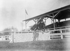 Horse Shows - Melvin Hazen Jumping, 1912. Creator: Harris & Ewing.
