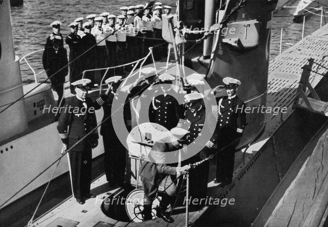 Adolf Hitler inspecting the first German U-boats at Kiel, Germany, August 1935. Artist: Unknown