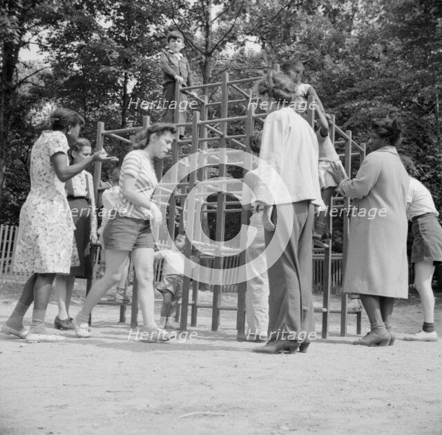 Mothers supervising their children at Camp Ellen Marvin, Arden, New York, 1943. Creator: Gordon Parks.