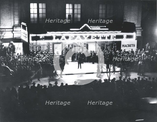 Crowd outside the Lafayette Theatre, in Harlem, at the opening of "Macbeth" produced..., 1936. Creator: Federal Theatre Project.