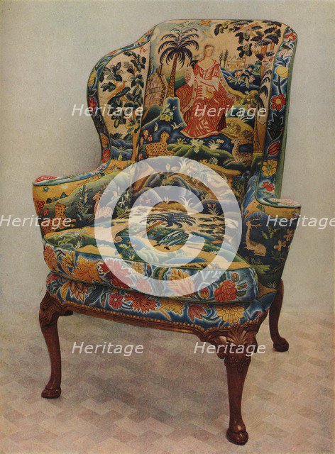 'An upholstered armchair with wings, carved walnut frame and original silk needlework covering', c17 Artist: Unknown.