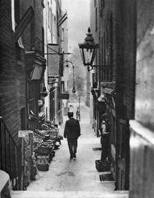 George Court (an alleyway leading to the Adelphi Theatre from the Strand), London, 1926-1927.Artist: Whiffin