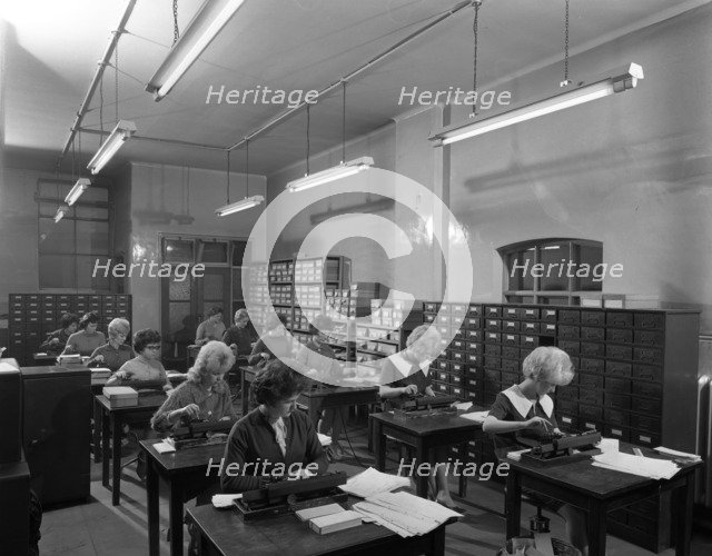 Tabulating machines in the punch room in a Sheffield Factory office, 1963.  Artist: Michael Walters