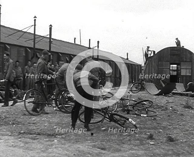 American Airmen Queueing up Outside a Building at an Airfield in England, 1943-1944. Creator: British Pathe Ltd.