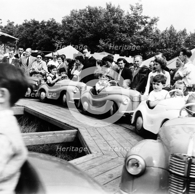 Hampstead fun fair, London, 1954. Artist: Henry Grant