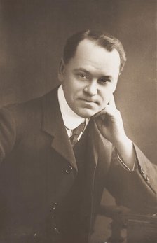 Malcolm Scott posing for a portrait, 1906. Creator: Unknown.