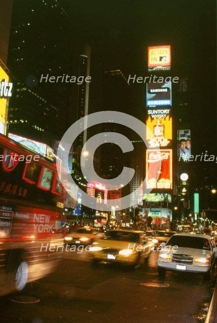 New York city street at night. Artist: Unknown.