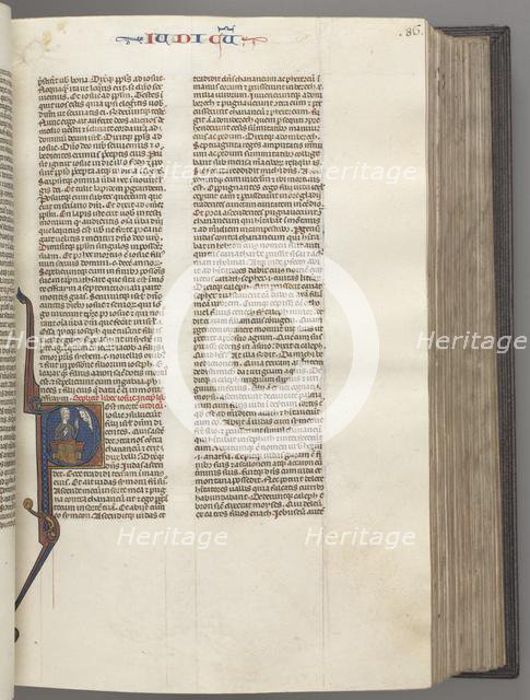 Fol. 86r, Judges, historiated initial R, Judah seated with a book talking to God, c. 1275-1300. Creator: Unknown.