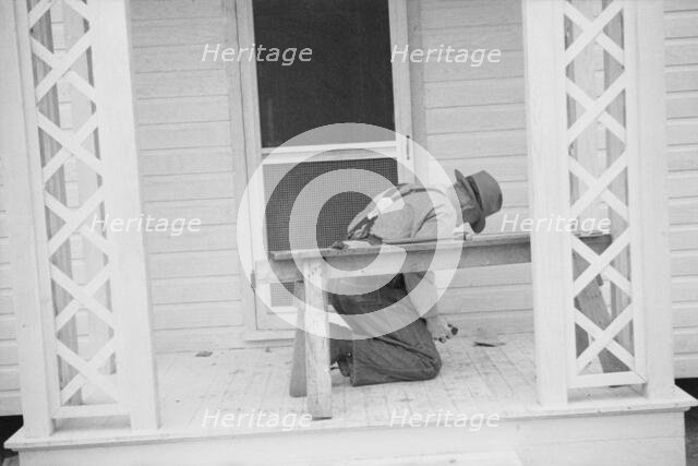 Possibly: Briar Patch Project, Carpenter at work, Eatonton, Georgia, 1936. Creator: Walker Evans.