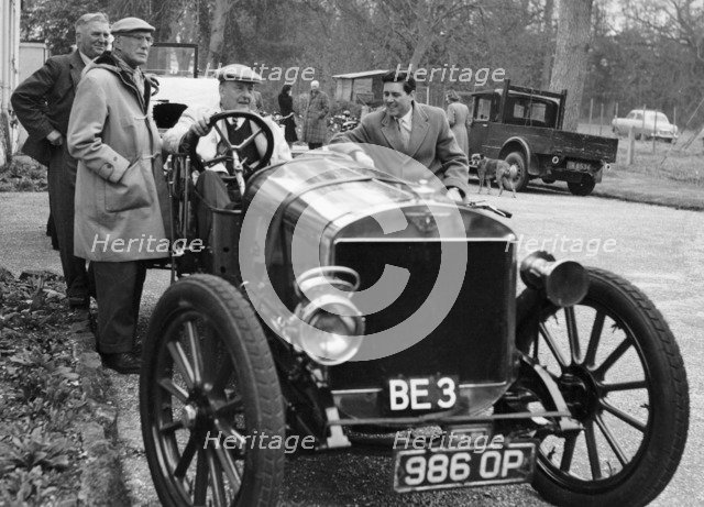Lord Brabazon in the driver's seat of a vintage car, 1956. Artist: Unknown