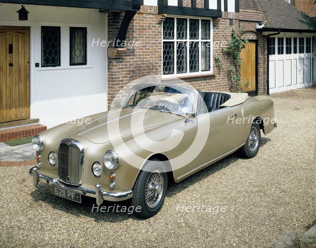 A 1963 Alvis car parked on a gravel driveway. Artist: Unknown