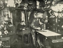 'At the Bottom of the Sea. In the wardroom of a submarine', (1919). Creator: Unknown.