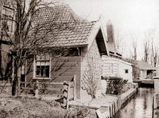 House on a canal bank, Broek, Netherlands, 1898.Artist: James Batkin
