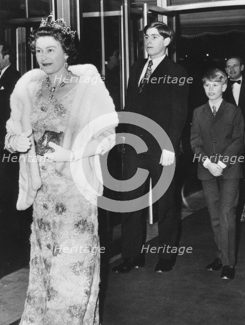 The Queen arriving with her youngest sons for a film premiere at the Leicester Square Theatre, 1974. Creator: Unknown.
