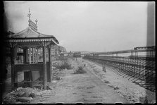 View along the Esplanade from beside a shelter, showing Admiralty scaffolding, Shanklin, IoW, 1945. Creator: George R Long.
