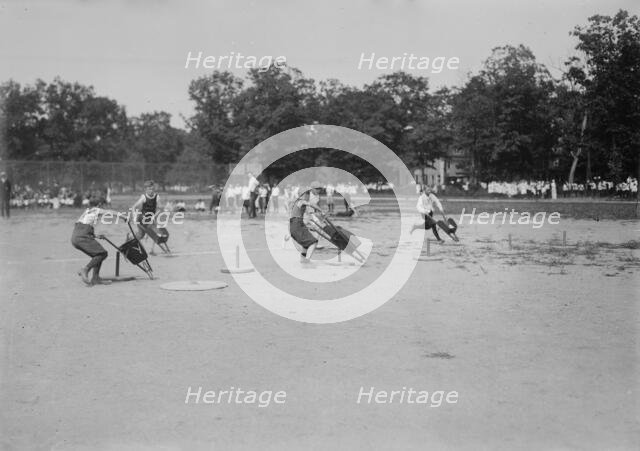 Brooklyn Children's Field Day [wheel-barrow race], between c1910 and c1915. Creator: Bain News Service.