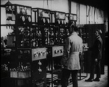 Engineers Observing Valves and Turning Pressure Dials, 1922. Creator: British Pathe Ltd.