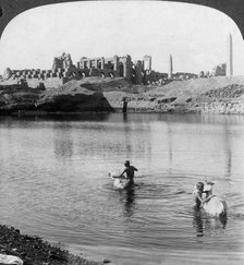 'Looking across the Sacred Lake to the great temple at Karnak, Thebes, Egypt', 1905.Artist: Underwood & Underwood