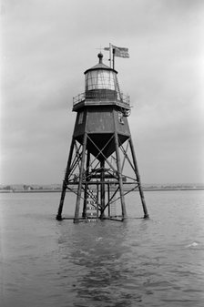 A Chapman Light in the Thames Estuary off Canvey Island, Essex, c1945-c1965. Artist: SW Rawlings