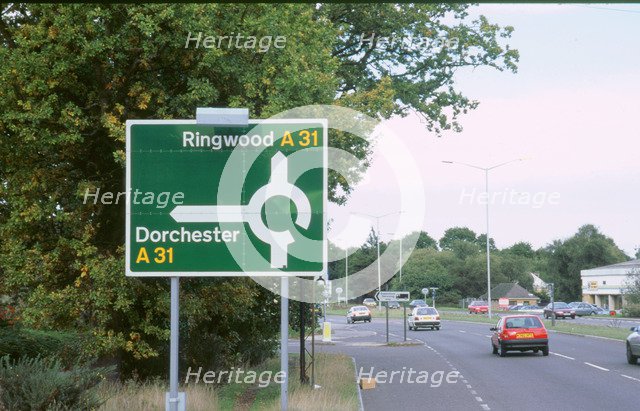 Road sign. A road. Artist: Unknown.