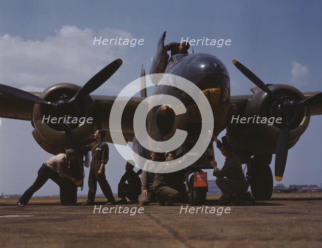 Servicing an A-20 bomber, Langley Field, Va., 1942. Creator: Alfred T Palmer.