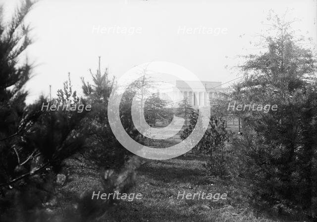 Lincoln Memorial Through Foliage of Potomac Park, 1917. Creator: Harris & Ewing.