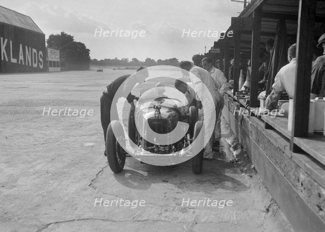 Amilcar C6 of Bill Humphreys in the pits, BRDC 500 Mile Race, Brooklands, 1931. Artist: Bill Brunell.