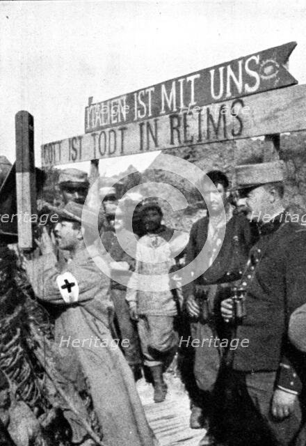 'les premieres operations Italiennes; "L'Italie est avec nous. Votre Dieu est mort a Reims"', 1915. Creator: Unknown.