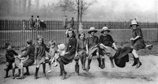 Children in a park, London, 1926-1927. Artist: Unknown