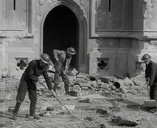 British Air Raid Wardens Clearing up Rubble Around the Palace of Westminster, 1941. Creator: British Pathe Ltd.