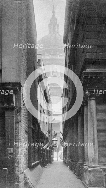 St Paul's Cathedral seen through a narrow courtyard, City of London. Artist: Unknown