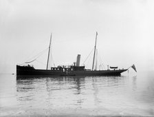 The 116 ton steam yacht 'Athena' at anchor, 1911. Creator: Kirk & Sons of Cowes.