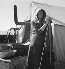 Texas woman in carrot pullers' camp, Imperial Valley, California , 1939. Creator: Dorothea Lange.