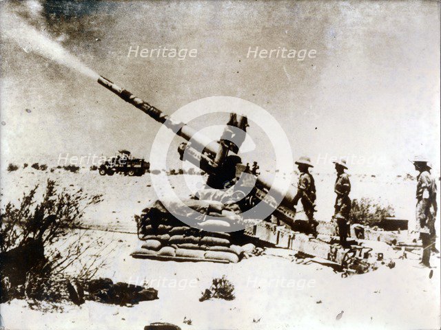 A British artillery piece in action, south of El Alamein, 1942. Artist: Unknown