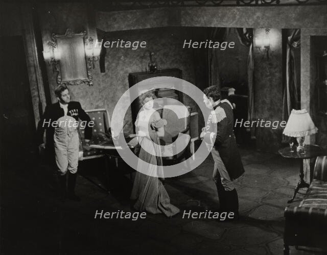 Two men and woman in evening dress, 1938. Creator: Unknown.
