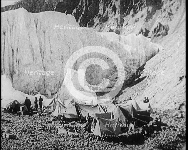 Tents and Groups of Civilians at a Base Camp at the Foot of Mount Everest, 1924. Creator: British Pathe Ltd.
