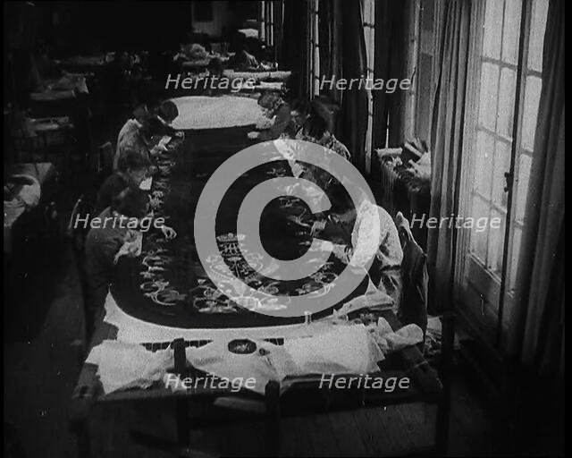 Seamstresses Sewing the Embroidery on the Coronation Mantle of King George VI, 1937. Creator: British Pathe Ltd.