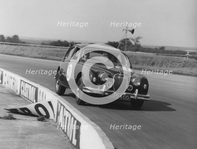 Jaguar 3.4 Mark1 J.W. Dean at Silverstone 1961. Creator: Unknown.