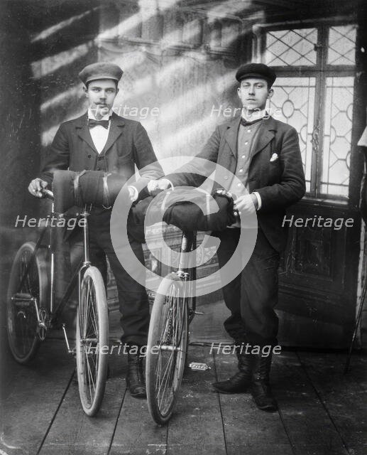 Cyclists in the studio; two men with bicycles, 1890-1910. Creator: Lars Olsson Akerman.